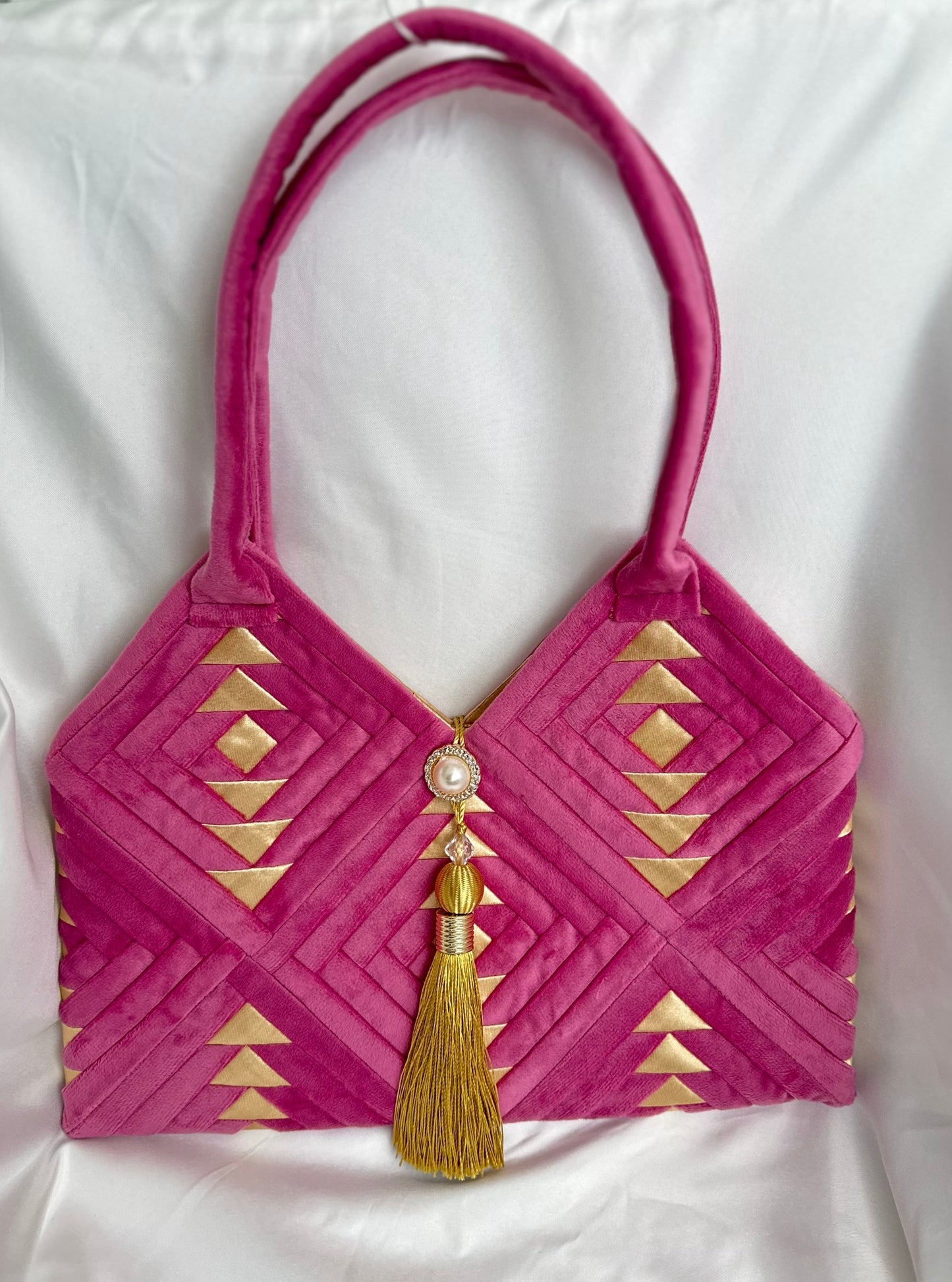 blush pink turkish velvet handbag, shoulder bag for womens, ladies mini purse, with golden details like triangles and tassel.